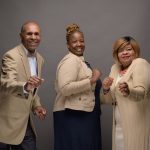 Portrait of the Polite family all dressed in tan colors.