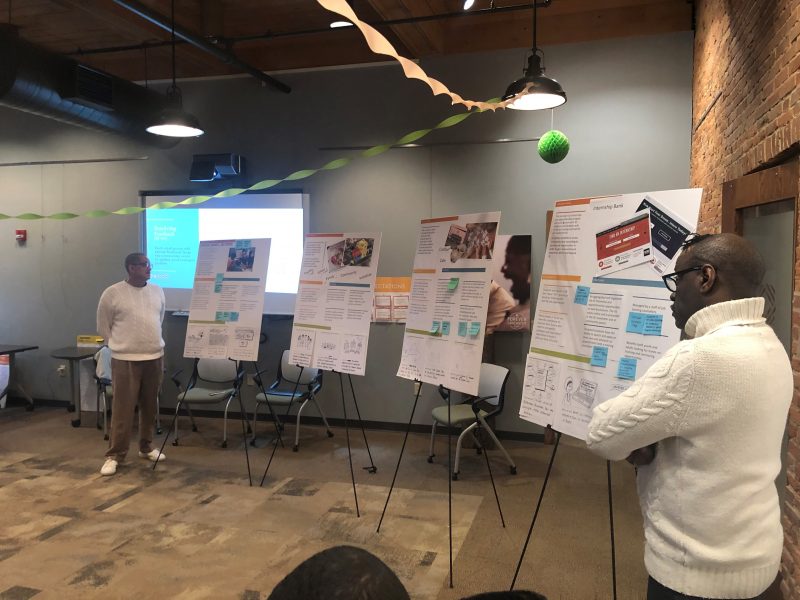 Photo of people brainstorming for Project activate