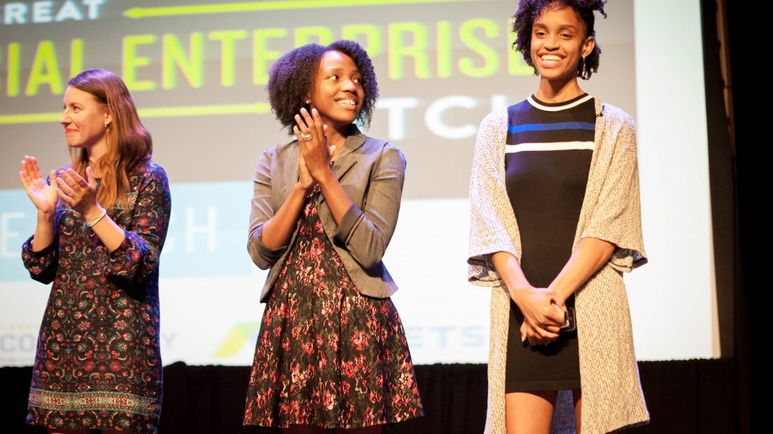 Three women on stage