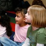 Group of children sitting on floor