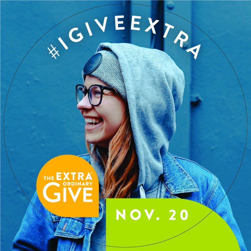 Photo of woman smiling with extra give digital photo frame