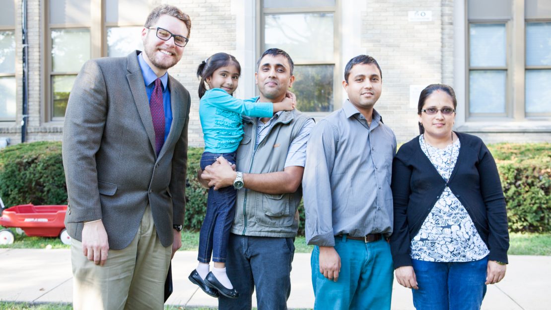 Group of people smile at camera