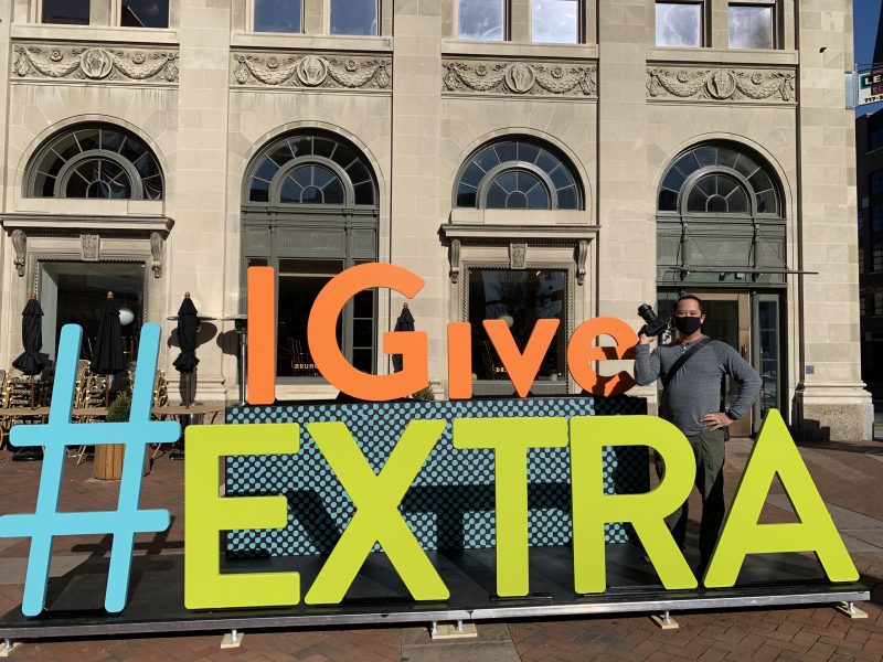 8 foot tall colorful letters spelling #IGiveExtra in Penn Square